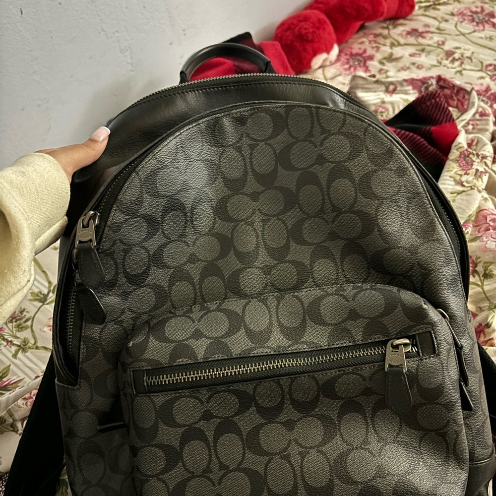 Coach outlet West Backpack in Signature Canvas.
